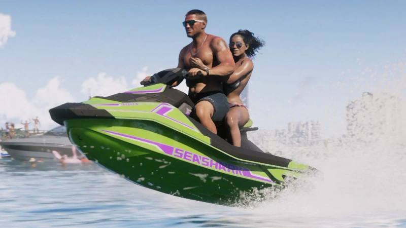 Un jet-ski Seashark blanc et bleu de marque Speedophile filant sur l'eau.