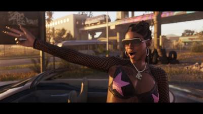 Bae-Luxe à côté de son cabriolet dans une scène du deuxième trailer de GTA 6